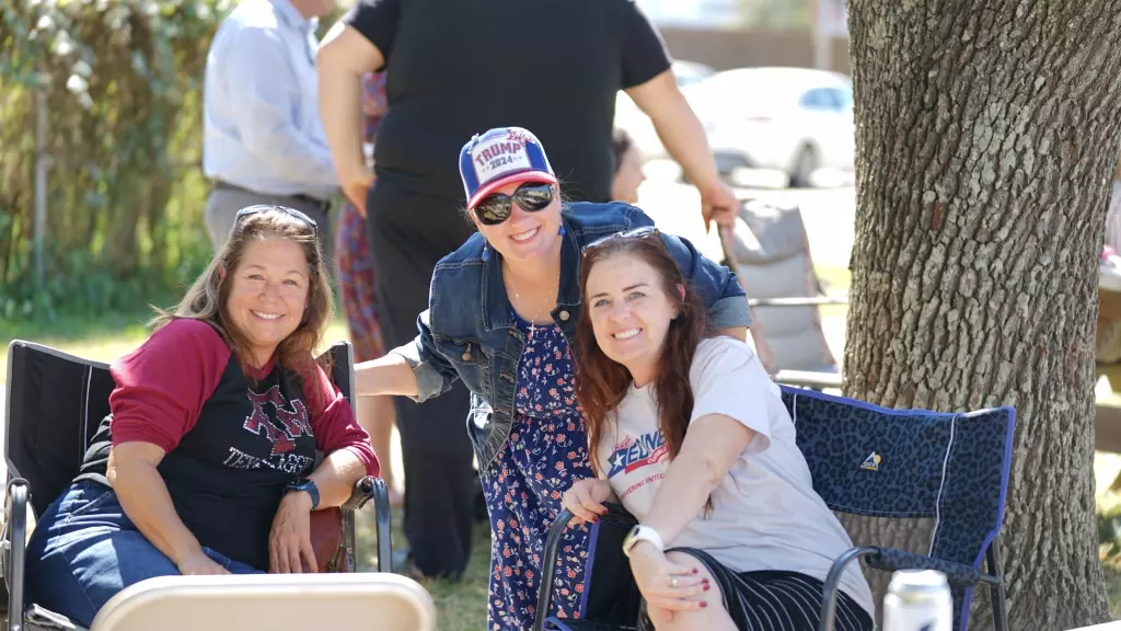 Community smiling at the festival